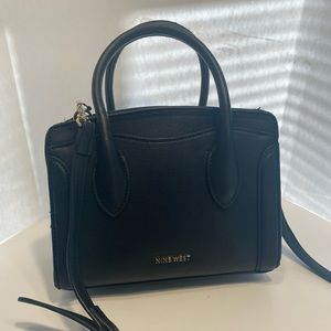 Small black Nine West hand bag with removable shoulder strap. (Gold hardware)